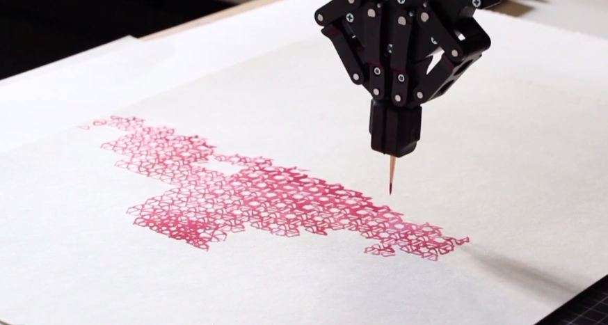 Il Robot Universal-Robot con pinza Robotiq mentre dipinge